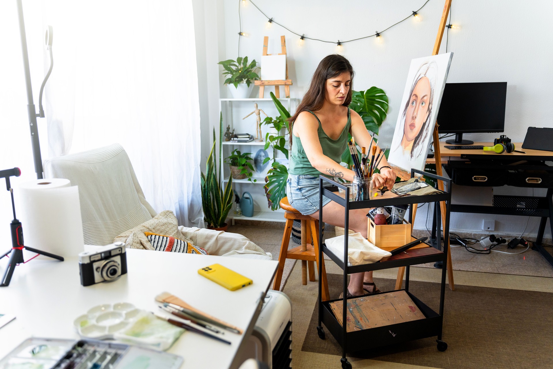 Talented artist developing her skills with watercolors at home
