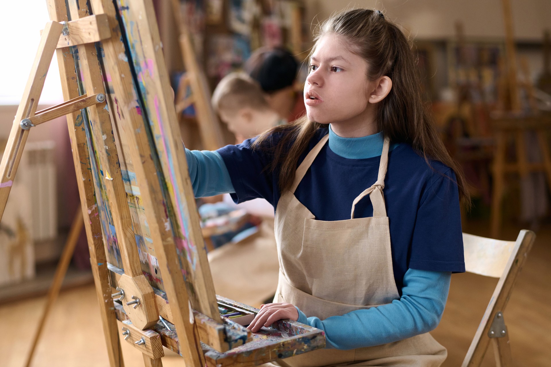 Girl with Disability Enjoying Art Class